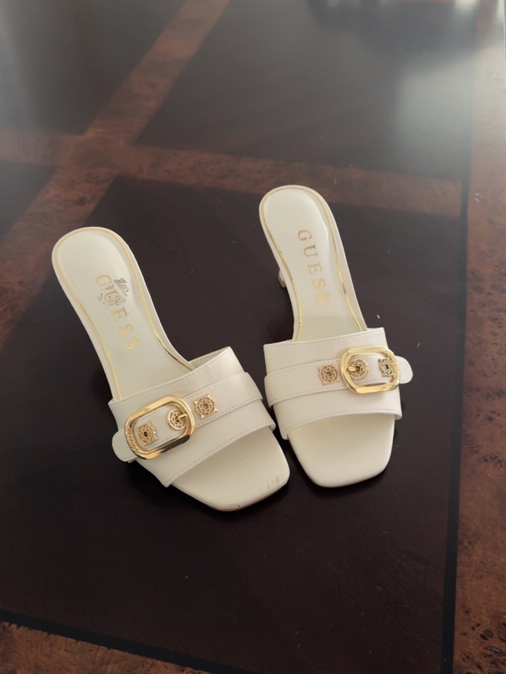 GUESS Cream Slide Mules with Gold Buckle Detail